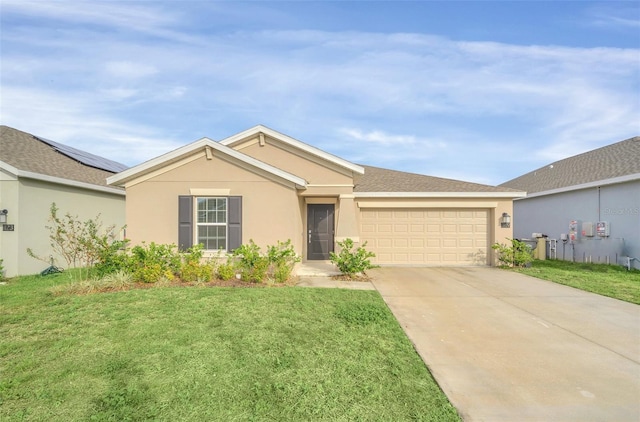 ranch-style home featuring a garage and a front yard