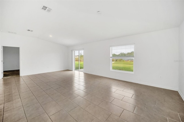 view of tiled spare room