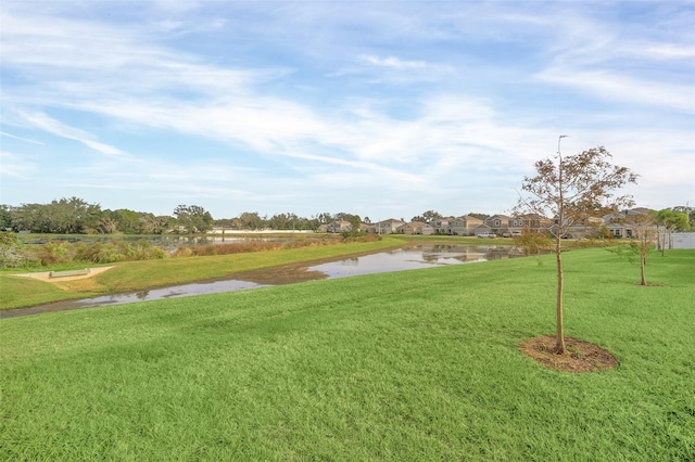 view of yard with a water view