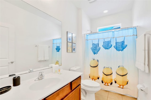 bathroom with tile patterned floors, vanity, curtained shower, and toilet