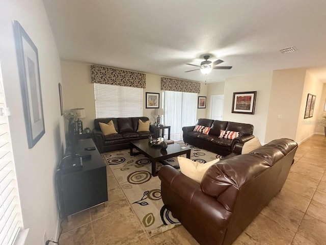 living room featuring ceiling fan