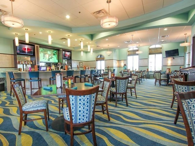 view of carpeted dining space