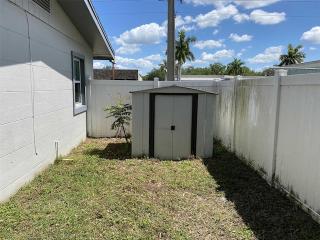 view of outbuilding with a lawn