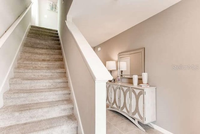 3475 Sandalwood Isle Way, Ocoee, FL 34761 - stairs with tile patterned flooring