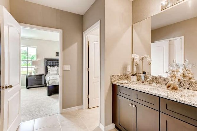 3475 Sandalwood Isle Way, Ocoee, FL 34761 - ensuite bathroom featuring vanity and tile patterned flooring