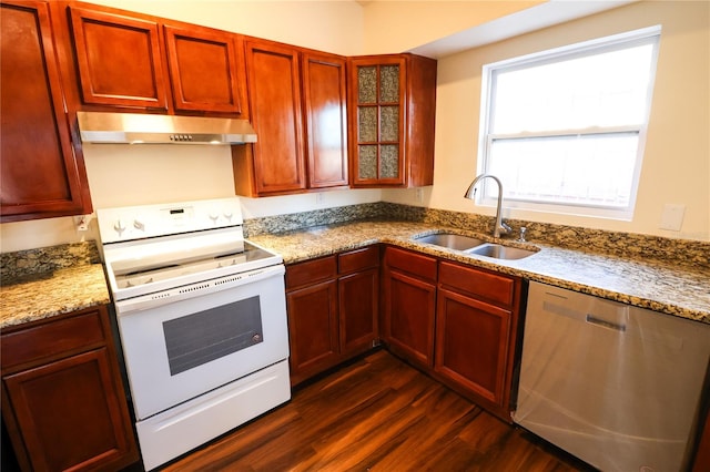 kitchen featuring light stone countertops, dark hardwood / wood-style flooring, stainless steel dishwasher, white range with electric stovetop, and sink