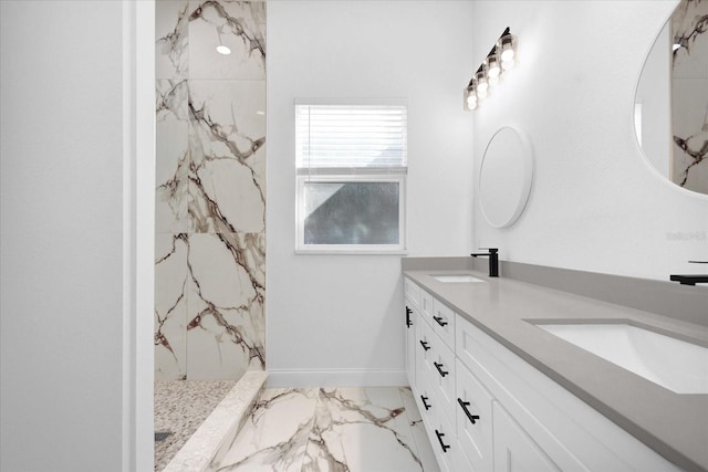 full bath featuring marble finish floor, a sink, baseboards, and double vanity