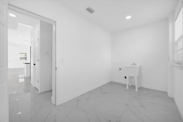 laundry room featuring laundry area, baseboards, visible vents, and hookup for an electric dryer