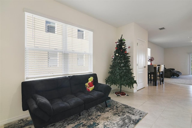 living room featuring light tile patterned floors