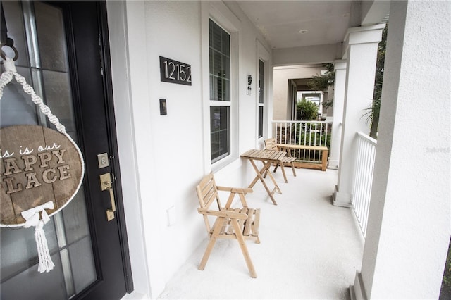 balcony featuring covered porch