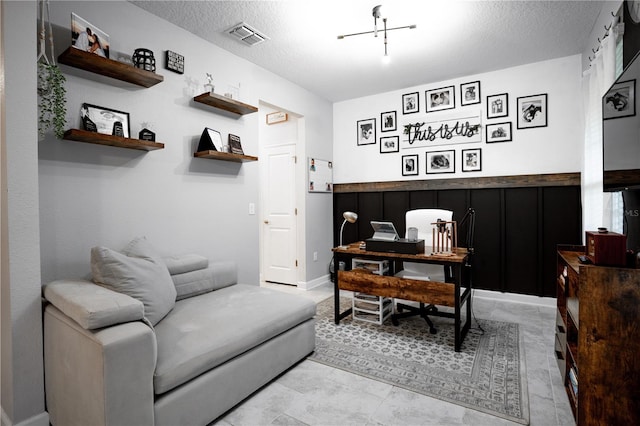 office featuring a textured ceiling