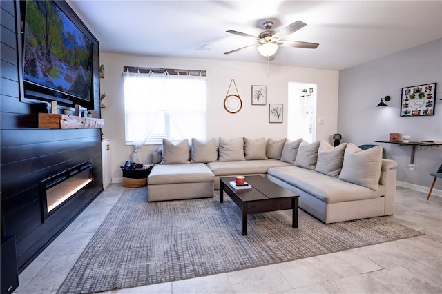 tiled living room with ceiling fan