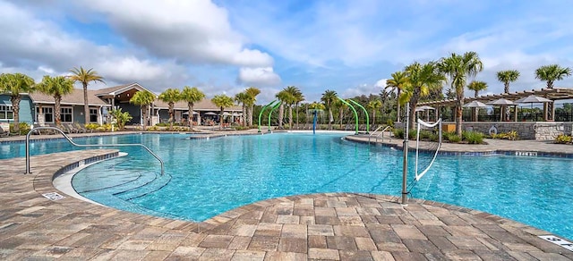 view of pool with a patio area