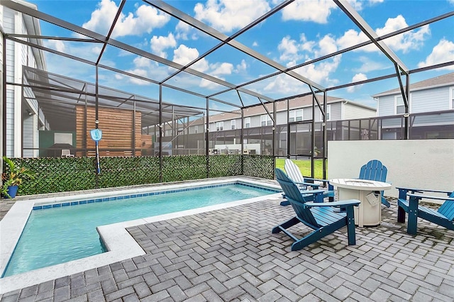 view of pool featuring a lanai and a patio area