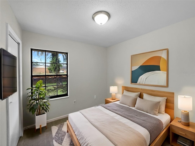 bedroom with a textured ceiling