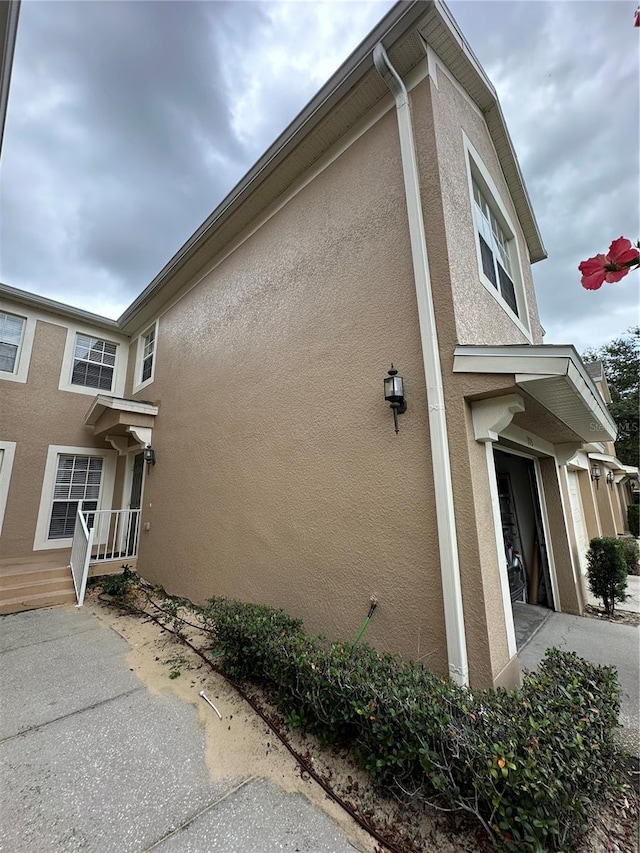 view of home's exterior with a garage