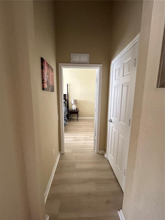 hall featuring light hardwood / wood-style flooring