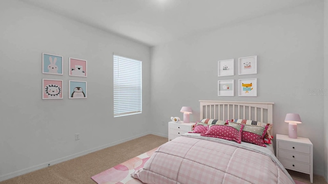 bedroom with light colored carpet