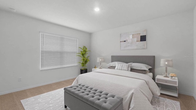 bedroom with light colored carpet