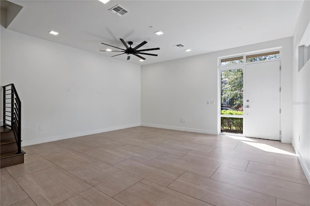 empty room featuring ceiling fan