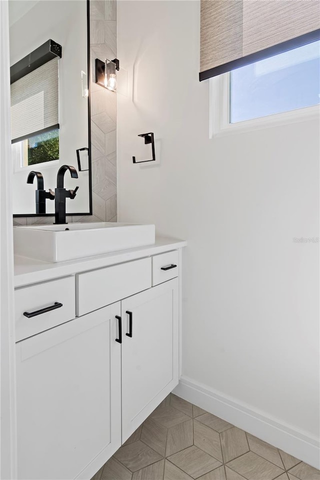 bathroom featuring vanity and plenty of natural light