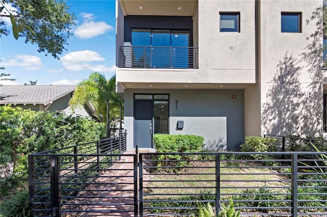 contemporary home with a balcony