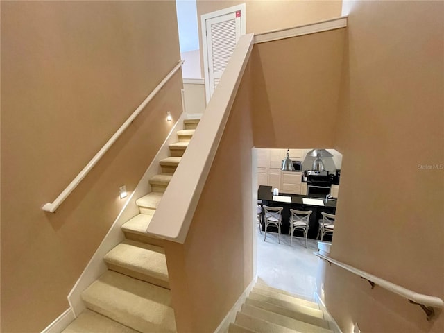 stairway with wood-type flooring