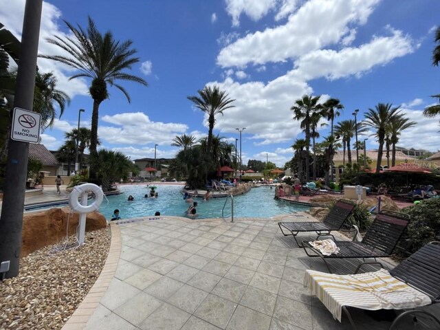 3520 Calabria Ave Unit 3520, Davenport, FL 33897 - community pool with a patio