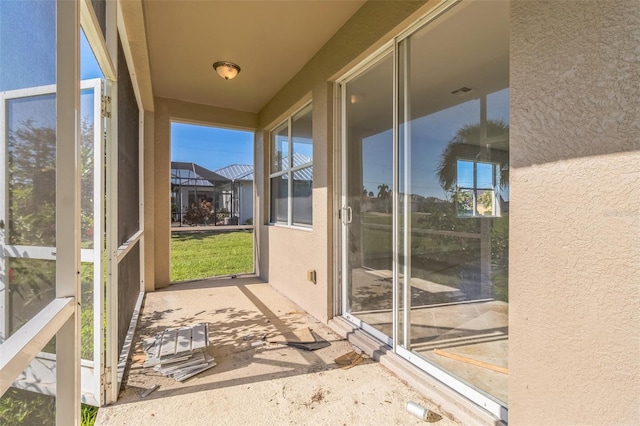 view of unfurnished sunroom