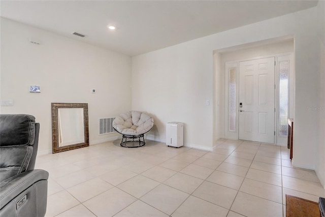 sitting room with light tile patterned floors