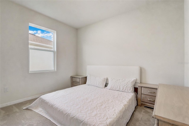 bedroom with light carpet