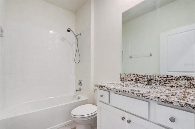 full bathroom with vanity, tiled shower / bath combo, toilet, and tile patterned flooring