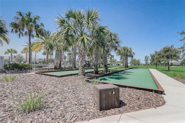 7889 Penrose Pl, Wildwood, FL 34785 - view of community featuring a bocce ball area and fence