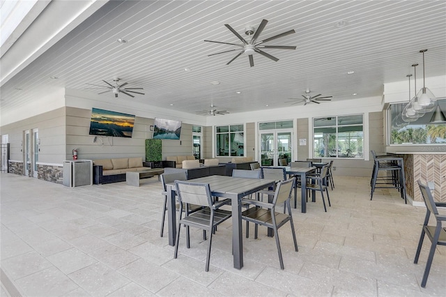 7889 Penrose Pl, Wildwood, FL 34785 - view of patio featuring outdoor lounge area, ceiling fan, outdoor dining area, and french doors
