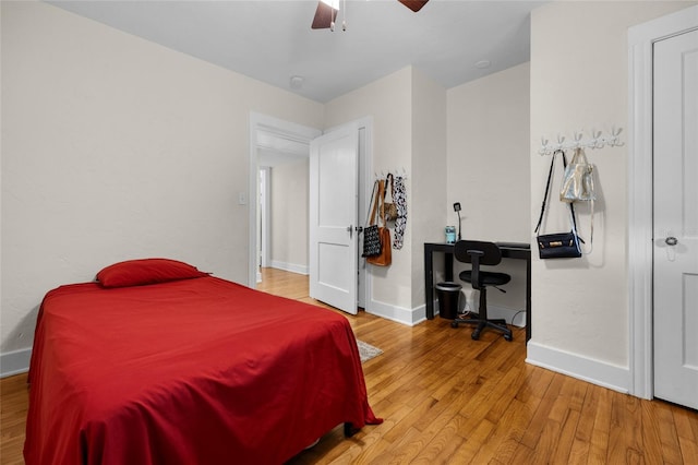 bedroom featuring ceiling fan and light hardwood / wood-style flooring