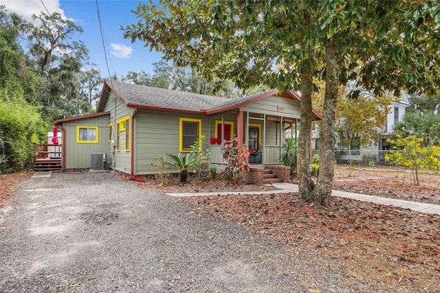 view of front of home featuring cooling unit and covered porch