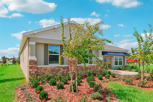 exterior space with a front lawn