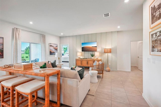 living room with light tile patterned flooring