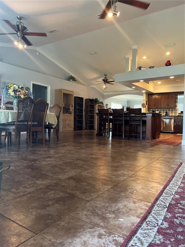 dining area featuring ceiling fan and vaulted ceiling