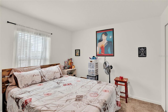 bedroom featuring carpet