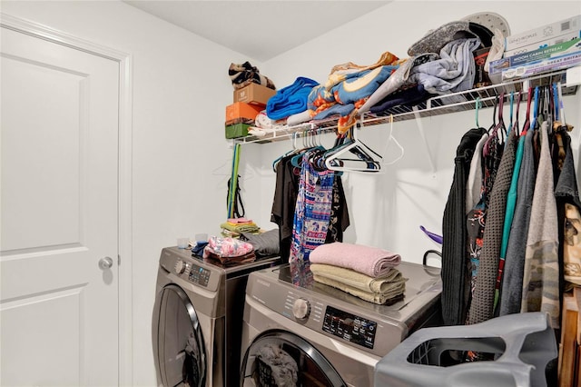 clothes washing area with independent washer and dryer