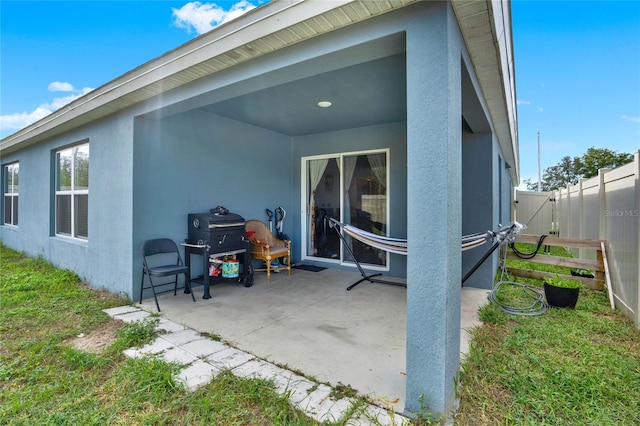 back of house featuring a patio area