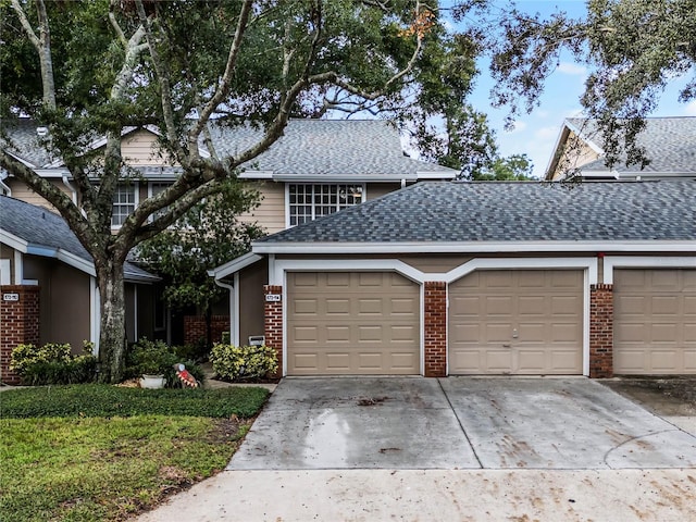 front of property with a garage