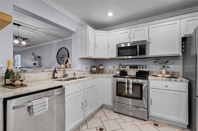 kitchen featuring white cabinets, appliances with stainless steel finishes, ornamental molding, and decorative light fixtures