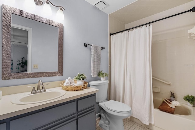 full bathroom featuring toilet, vanity, shower / bath combo, and tile patterned floors