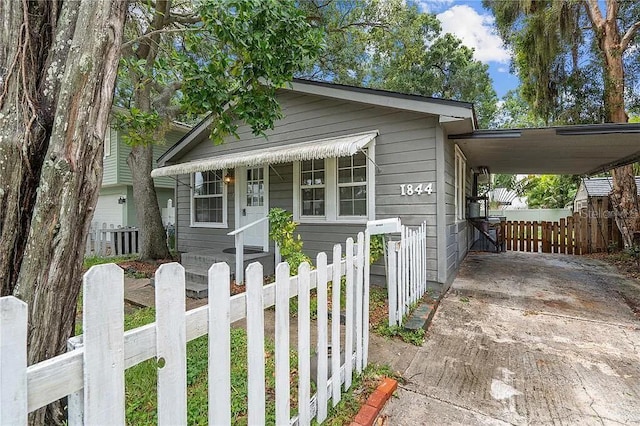 view of front of house with a carport