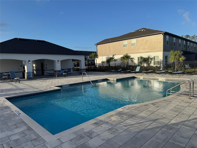 view of pool featuring a patio