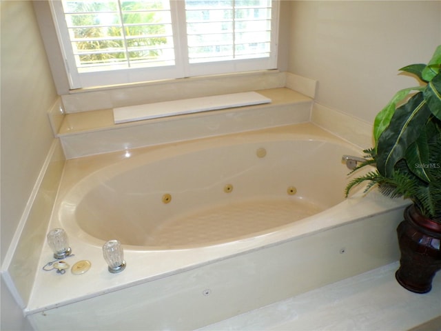 bathroom featuring a bath