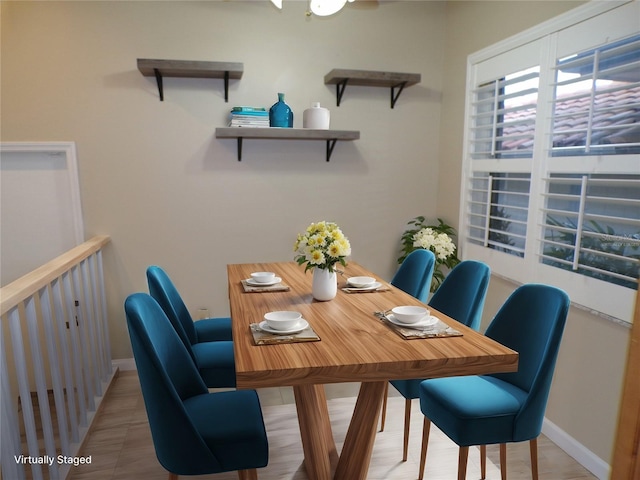 dining area featuring hardwood / wood-style flooring