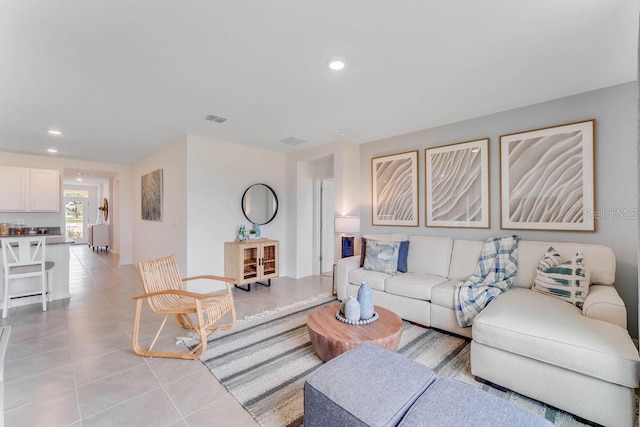 living room featuring light tile patterned flooring